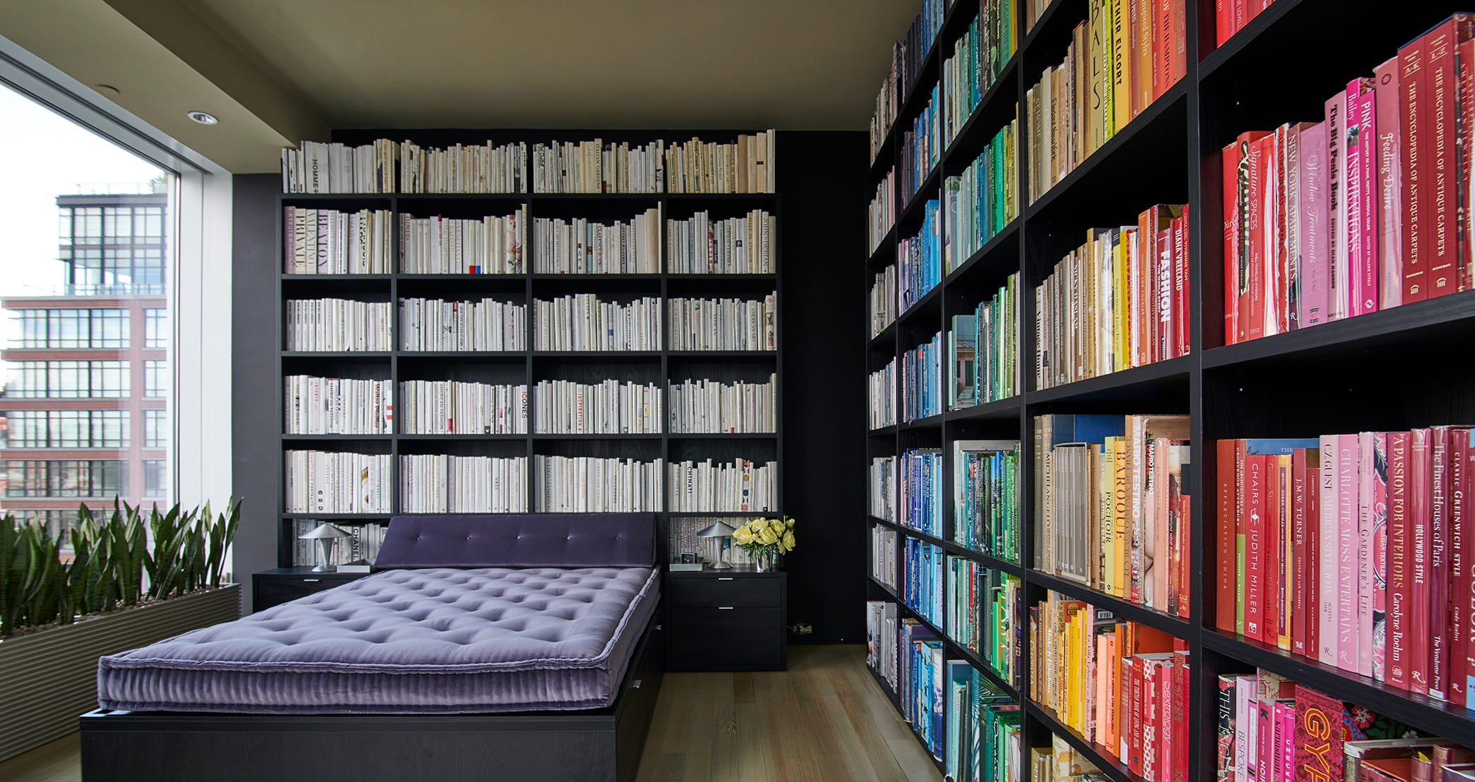 Kevin Sharkey's NYC skyrise condo with custom library bookshelves created by California Closets