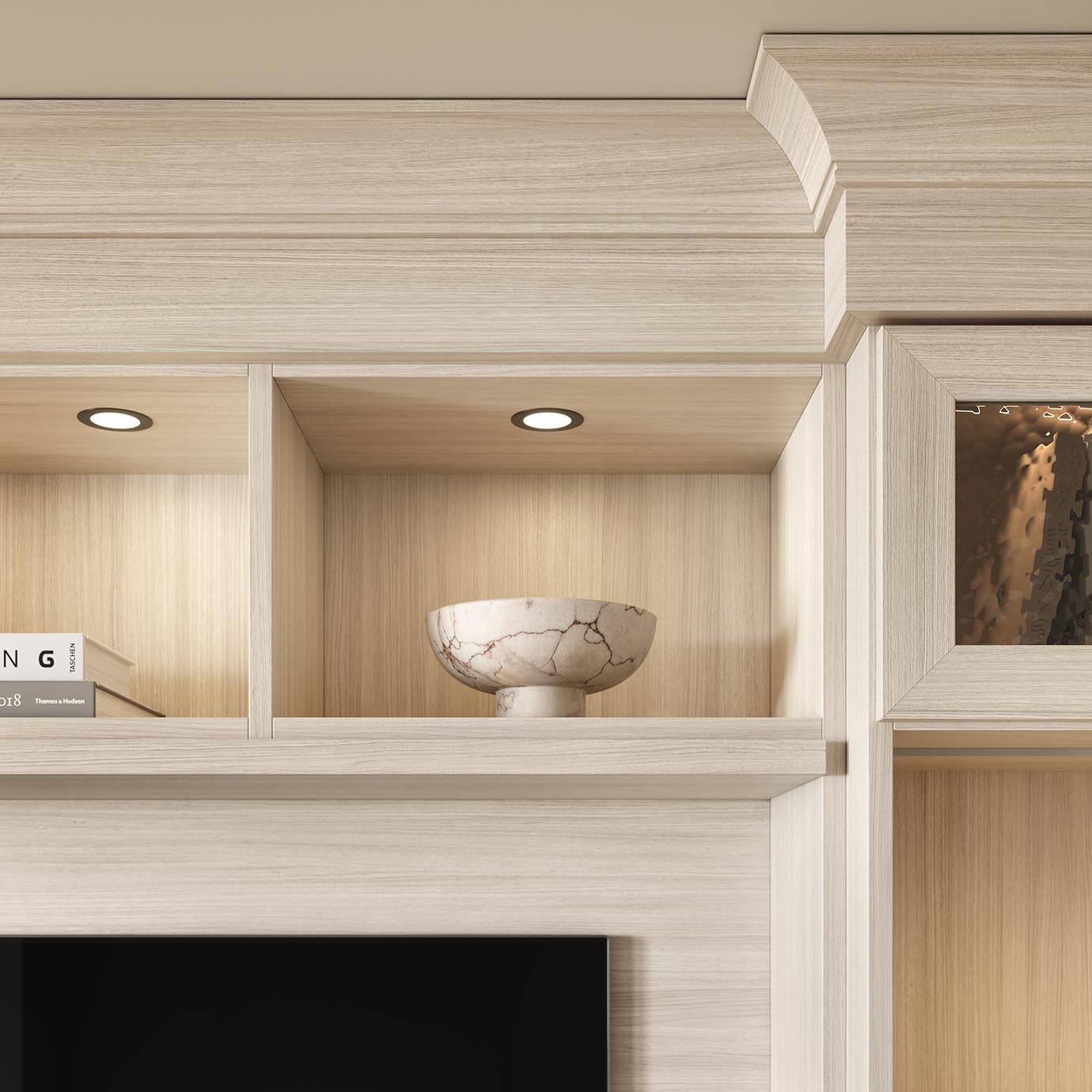 Custom built entertainment center molding and lighting detail from California Closets